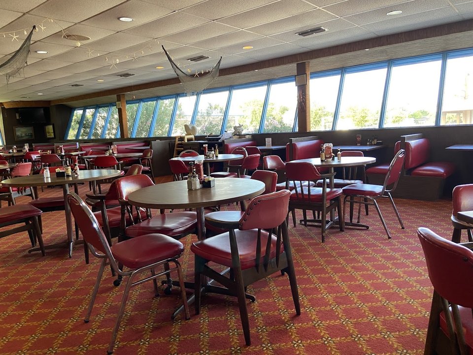Retro seafood dining room with table service.