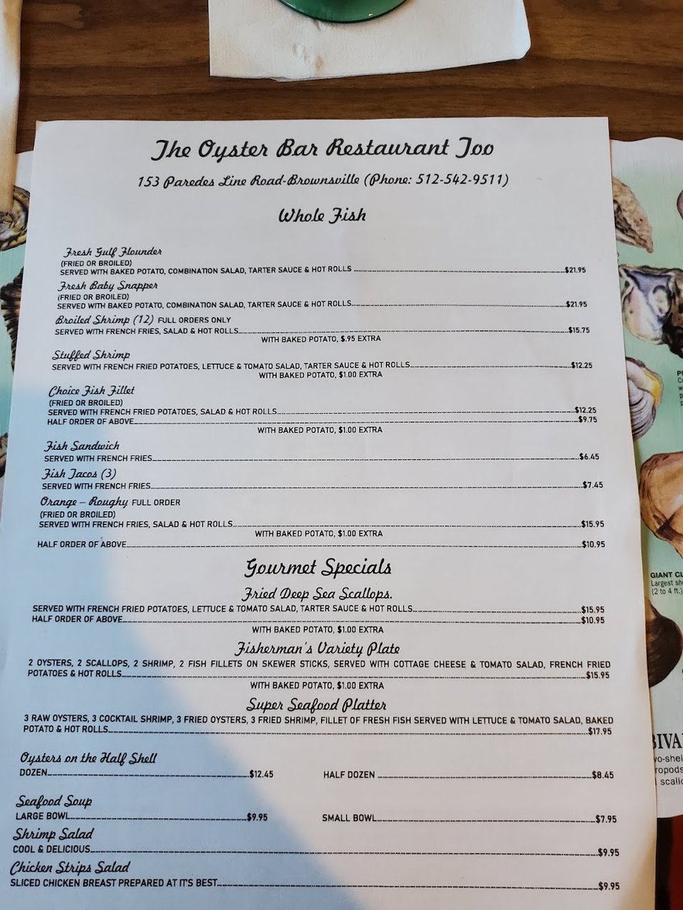 Menu page featuring oysters, shrimp, and fish.