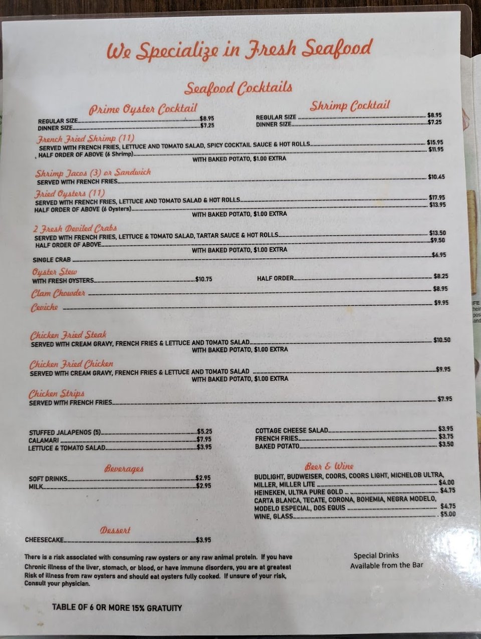 Seafood specials listed beside classic American sides.