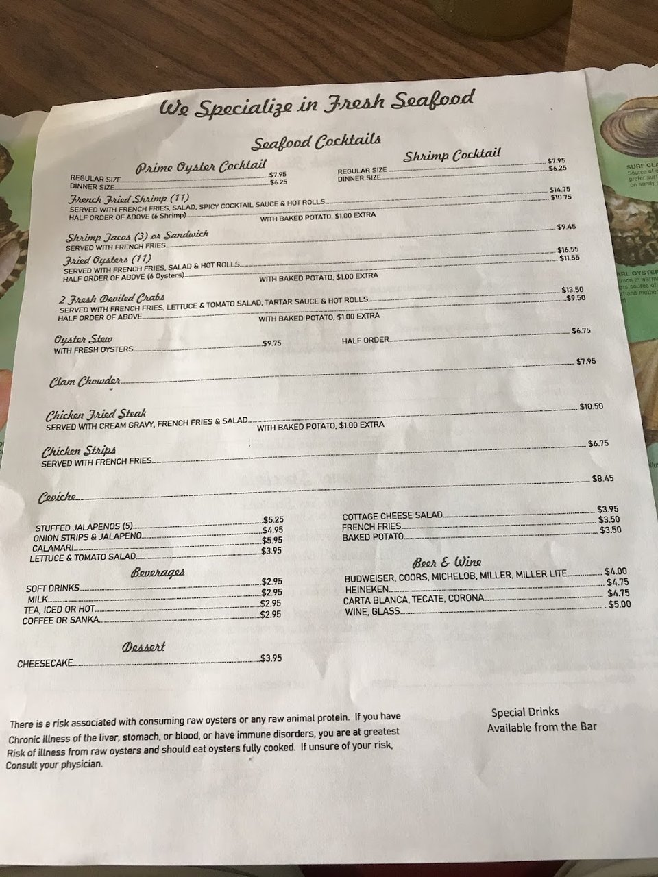 Printed menu with fried and broiled seafood.